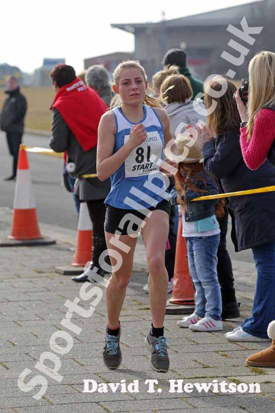 Chloe Price finishing the womens Transped Blyth Valley 10k.